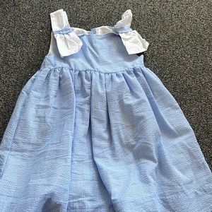 Blue bow arm dress